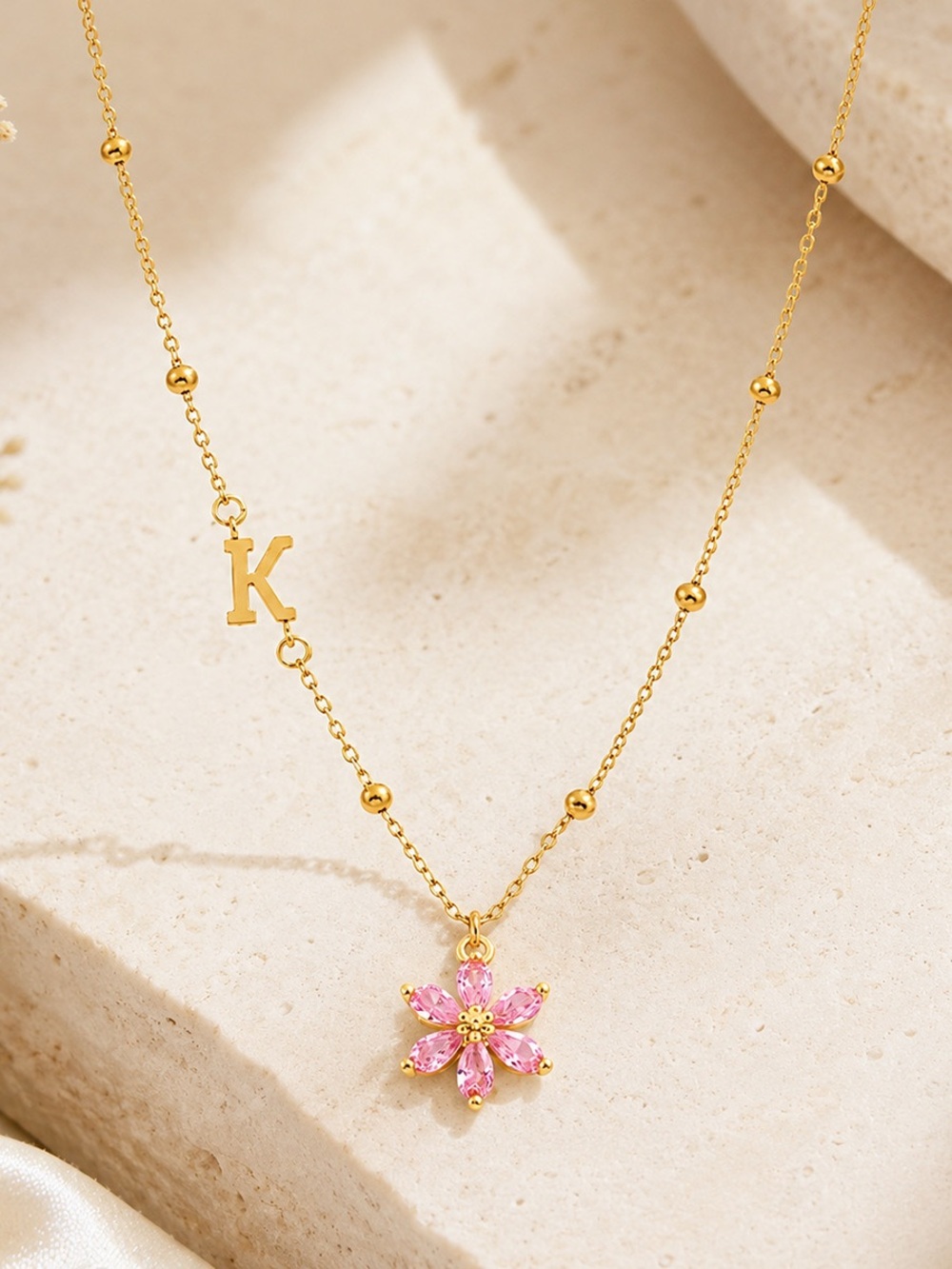 Gold Initial 'K' Necklace with Pink Flower Pendant